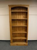 A pine bookcase,