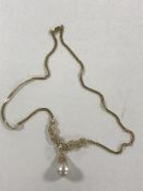 An 18ct gold pearl and diamond necklace
