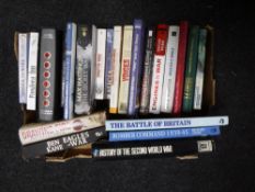 A box of books relating to war