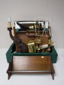 A box containing a leather briefcase, a pair of brass table lamps,