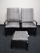 A pair of metal adjustable garden armchairs with cushions together with a stool
