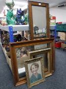 An early 20th century oak framed bevelled hall mirror together with an Edwardian oak frame,