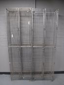 A pair of metal mesh lockers