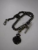 A sterling silver Albert chain with fob