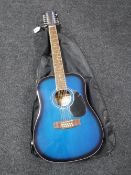A Wesley 12 string acoustic guitar in carry bag