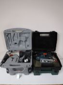 Four cased power tools including Black and Decker jigsaw, Bosch sander,