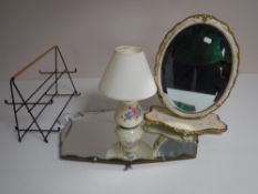 A frameless bevel edge mirror, together with a cream and gilt oval dressing table mirror,