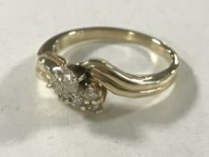 A 14ct gold diamond set ring, the total diamond weight estimated at 0.2 carat, 3.