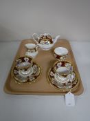 A nine-piece Royal Albert Lady Hamilton tea for two CONDITION REPORT: Teapot lid