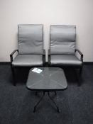 A pair of metal adjustable garden loungers with cushions,