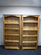 A pair of pine open bookshelves,