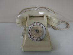 A cream Bakelite French telephone CONDITION REPORT: One crack to the rear side of