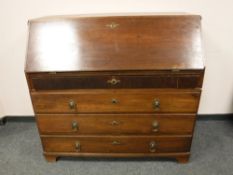 A nineteenth century oak bureau,