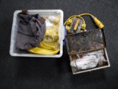 A box containing transformer extension leads, hand tools, tool belt,