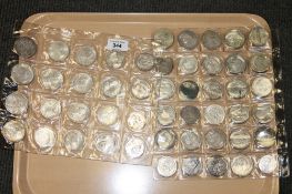 A collection of fifty assorted Victorian and later crown sized coins