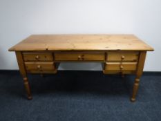 A pine kneehole writing desk,