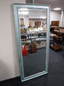A painted framed hall mirror
