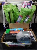 A box containing eight folding childs chairs,