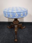 A Victorian mahogany circular dressing table stool