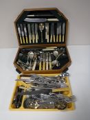 A walnut canteen of plated cutlery,