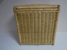 A wicker laundry hamper
