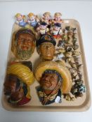 A tray containing four Bossons wall plaques, Wade Whimsies, Pek pig,