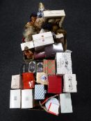 Two boxes containing boxed and unboxed collectors dolls including Ashton Drake,