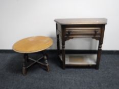 An oak hall table fitted a drawer,