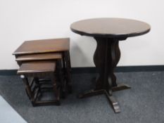 A circular pedestal oak pub table,