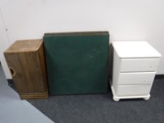 Four folding card tables together with a walnut bedside cabinet and a painted three drawer bedside