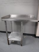 A stainless steel two tier prep table