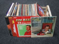 Twenty four boxes containing LP records and 7