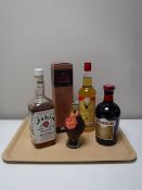 Five bottles of alcohol including Famous Grouse, Stag Royal Canadian Spirit,