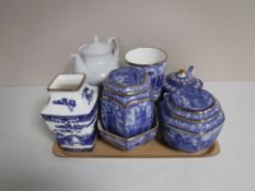 A tray containing a quantity of Ringtons blue and white china including wall plates, tea pots,