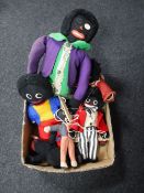 A box containing golly soft toys