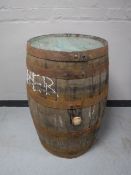 A coopered oak barrel