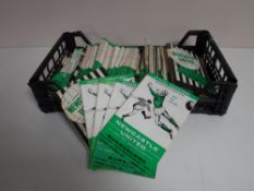 A basket containing a quantity of Newcastle United mid twentieth century and later match day
