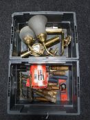 A crate containing chisels, wood working plane and two boxes of spark plugs,