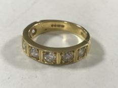 An 18ct gold seven stone half-eternity ring, approximately 1.4 carat, 5.