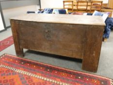 An early nineteenth century carved oak blanket chest,