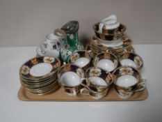 A tray containing late nineteenth century salon part tea set, peter mounted jug, tea china,