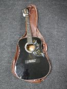 A Korean Hondo model H124BHM acoustic guitar with carry bag