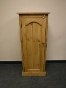 A reclaimed pine single door cupboard,