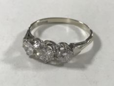 An 18ct gold three stone diamond ring, approximately 1.