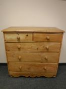 A Victorian pine five drawer chest,