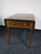 A Victorian inlaid mahogany Sutherland table