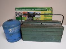 A boxed double camping burner and grill,