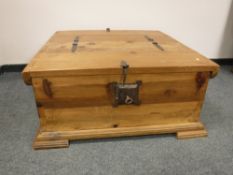 A rustic pine storage coffee table,