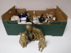 A box containing a collection of brass and china ornaments, commemorative china,