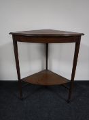 A Victorian inlaid mahogany two-tier corner stand